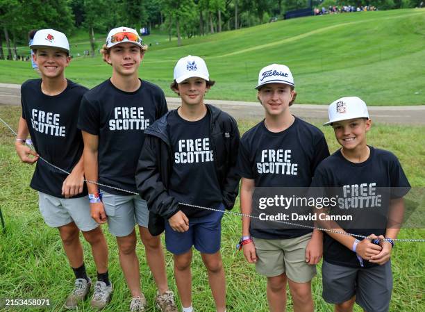 Group of young boys wear tee shirts in support of Scottie Scheffler during the second round of the 2024 PGA Championship at Valhalla Golf Club on May...