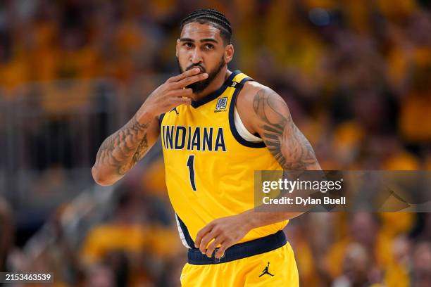 Obi Toppin of the Indiana Pacers celebrates after a three point basket during the first quarter against the New York Knicks in Game Six of the...