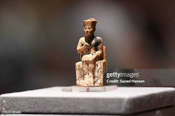 Statue of King Khufu is displayed in the Egyptian Museum during International Museum Day at the Egyptian Museum on May 18, 2024 in Cairo, Egypt.