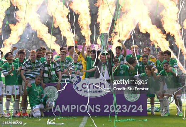 Celtic manager Brendan Rodgers holds aloft the league winners trophy after the Cinch Scottish Premiership match between Celtic FC v St Mirren at...
