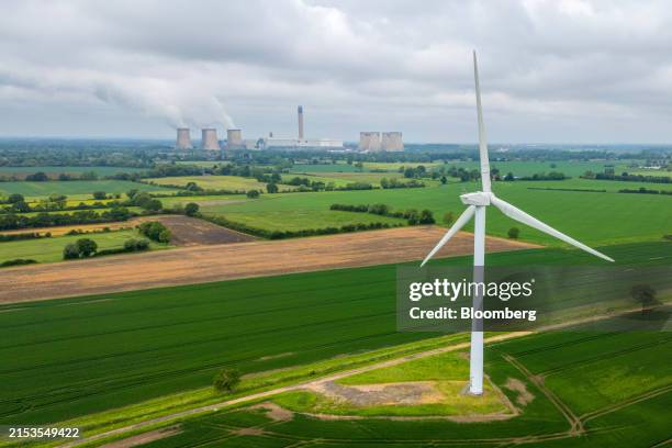 Wind turbine in a field near the Drax Power Station, operated by Drax Group Plc, near Selby, UK, on Tuesday, May 21, 2024. Regulator Ofgem are due to...