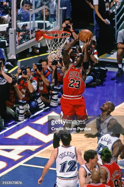 Michael Jordan of the Chicago Bulls drives to the basket during the game against the Utah Jazz during Game 1 of the 1998 NBA Finals on June 3, 2024...