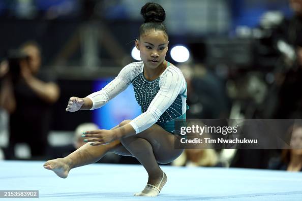 Simone Core Simone Rose performs a floor routine during the Core Hydration... News ...