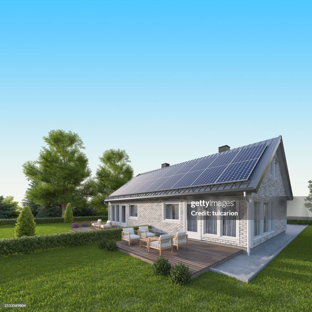 Solar Panels on a Gray Metal Roof of Modern White Brick House