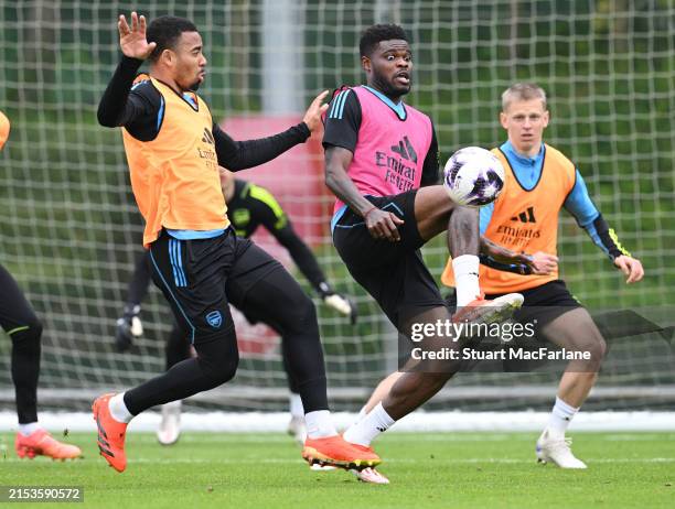 Gabriel Jesus and Thomas Partey of Arsenal during a training session at London Colney on May 18, 2024 in St Albans, England.