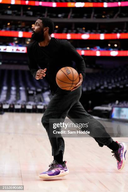 Kyrie Irving of the Dallas Mavericks warms up prior to Game Six of the Western Conference Second Round Playoffs against the Oklahoma City Thunder at...