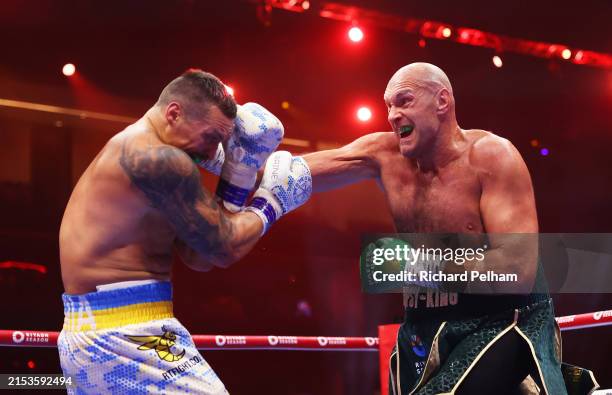 Tyson Fury punches Oleksandr Usyk during the IBF, WBA, WBC, WBO and Undisputed Heavyweight titles' fight between Tyson Fury and Oleksandr Usyk at...