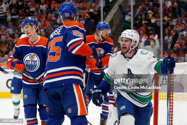 Nils Hoglander of the Vancouver Canucks celebrates after scoring a goal against the Edmonton Oilers during the first period in Game Six of the Second...