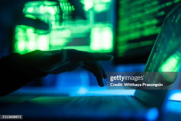 hackers with credit cards on laptops use these data for unauthorized shopping. unauthorized payments from credit card owners - computer crime stock pictures, royalty-free photos & images