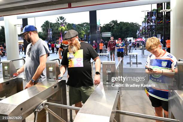 Supporters enter the stadium during the round 11 NRL match between Melbourne Storm and Parramatta Eels at Suncorp Stadium, on May 19 in Brisbane,...
