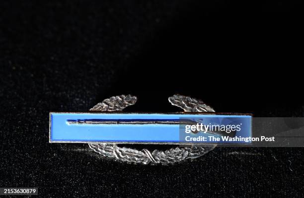 Combat Infantry badge is displayed for a photograph at Arlington National Cemetery on Friday May 17, 2024 in Arlington, Va. The cemetery has...