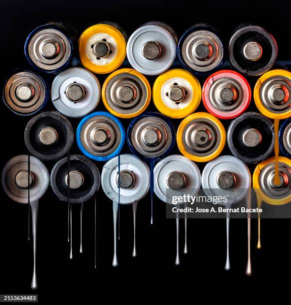 damaged ni-mh rechargeable batteries melt due to heat and excessive use. - electric battery stock pictures, royalty-free photos & images