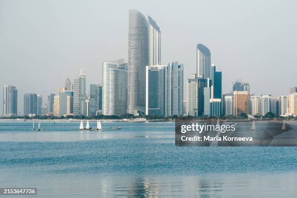 city skyline and cityscape in abu dhabi.uae - abu dhabi skyline stock pictures, royalty-free photos & images