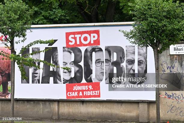 An election poster of Hungary's ruling Fidesz party reading "Stop War" with the portraits of former government insider Peter Magyar, Hungarian born...