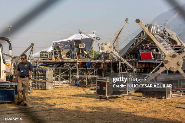Member of forensic services inspects the area where a stage collapsed the day before during a campaign rally for Mexican presidential candidate Jorge...