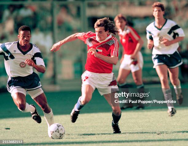 Ivo Knoflicek of Czechoslovakia is closed down by Desmond Armstrong of the United States during a FIFA World Cup Group A match at the Stadio Comunale...