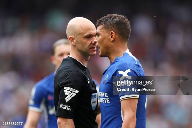 Referee Anthony Taylor interacts with Thiago Silva of Chelsea during the Premier League match between Chelsea FC and AFC Bournemouth at Stamford...