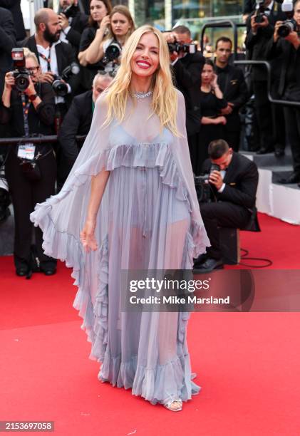 Sienna Miller attends the "Horizon: An American Saga" Red Carpet at the 77th annual Cannes Film Festival at Palais des Festivals on May 19, 2024 in...