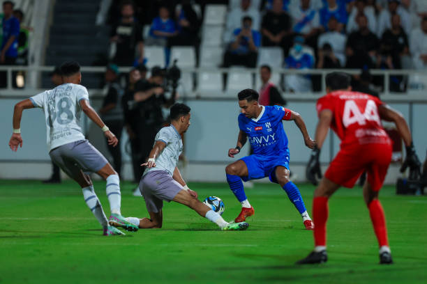 Salem Al Dawsari of Al Hilal battling for the ball during the Saudi Pro League match between Al-Hilal and Al Ta´ee at Al Shabab Club Stadium on May...