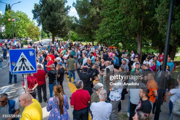 Montenegrin Serbs, carrying flags, gather to protest the resolution declaring July 11 the International Day of Reflection and Commemoration of the...