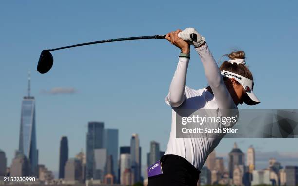Nelly Korda of the United States plays her shot from the 18th tee during the final round of the Mizuho Americas Open at Liberty National Golf Club on...