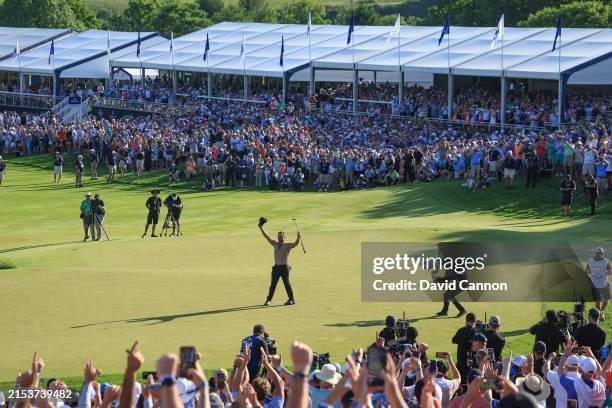 Xander Schauffele of The United States celebrates as he secured a one shot win with a birdie on the 18th hole in the final round of the 2024 PGA...