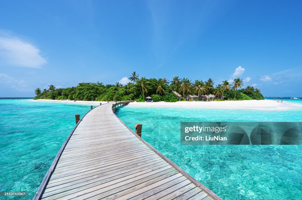 Boardwalk into tropical paradise island