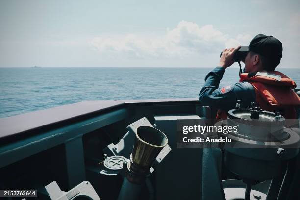 Screen grab captured from a video shows the China's vessel is being monitored by Taiwan military as China conducts joint military drill around Taiwan...