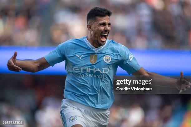 Rodri of Manchester City celebrates scoring the third goal during the Premier League match between Manchester City and West Ham United at Etihad...
