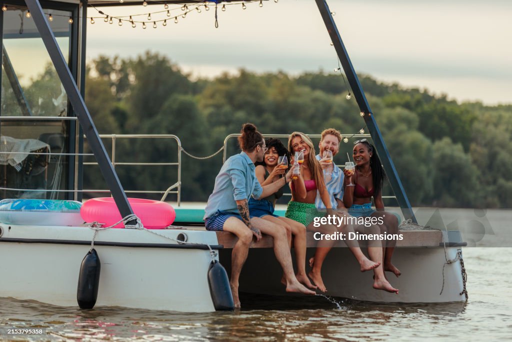 Friends on a boat having drinks