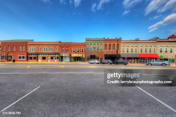 facades along state street - small town america stock pictures, royalty-free photos & images