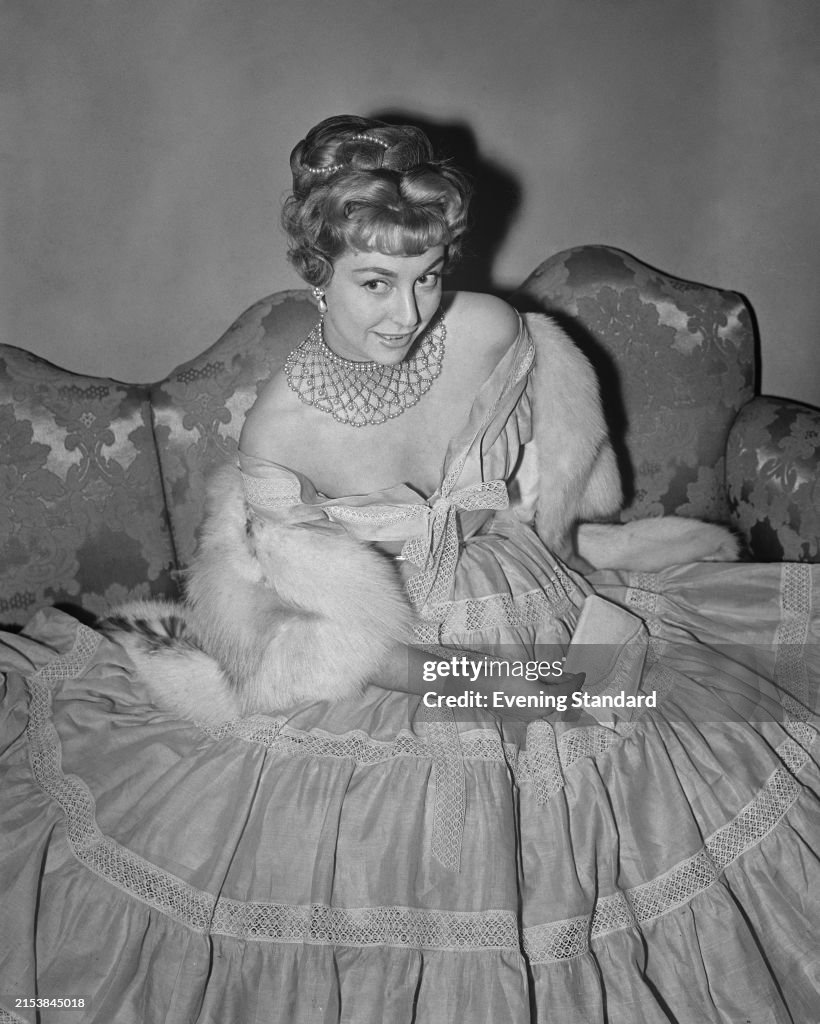 Frances Roe Socialite Frances Roche dressed in an evening gown, May 1954. Roche ...