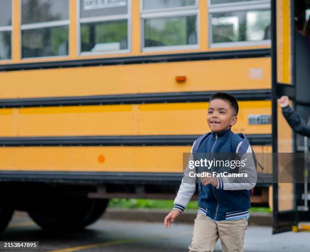Getting Off 387 Students Getting Off Bus Stock Photos, High-Res Pictures, and ...