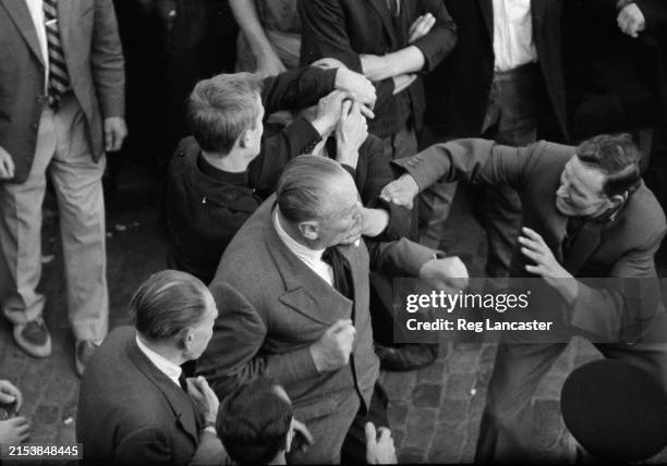 Mosley Rally Fascist Oswald Mosley is attacked by a member of the public during a ...