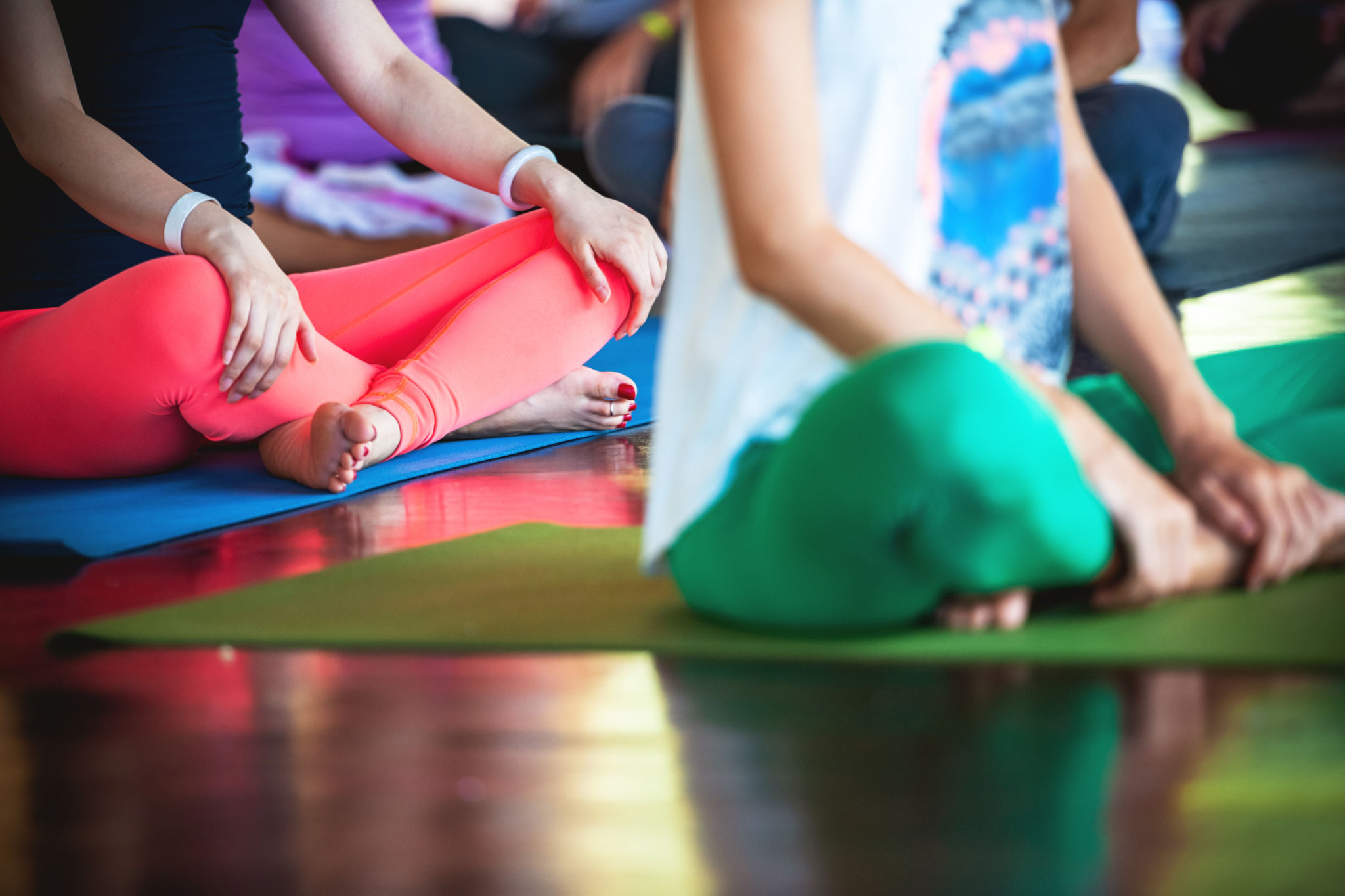 Group of female practicing yoga Group of female practicing yoga