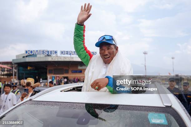 Legendary Mountaineer Kami Rita Sherpa waves at people as he arrives after scaling Mt Everest for the 30th time, leading the world record of most...