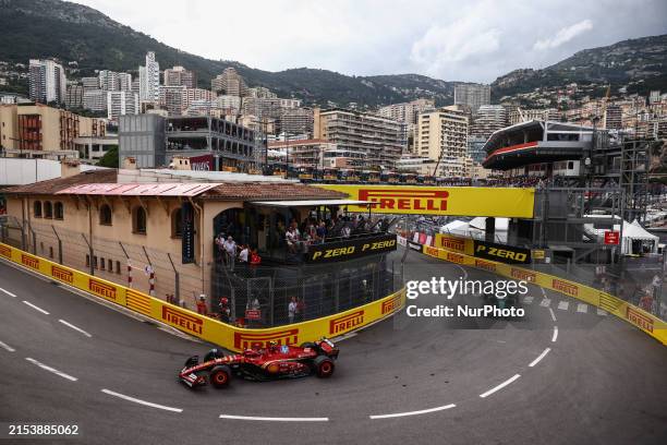 Carlos Sainz of Ferrari and Fernando Alonso of Aston Martin drive at La Rascasse corner during Practice 2 ahead of the F1 Grand Prix of Monaco at...
