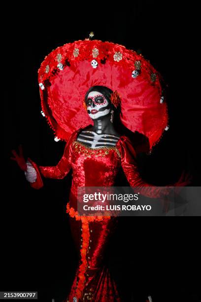Cosplayer dressed up as La Catrina, a character of La Vida book, poses for a photo as she attends the Argentina Comic Con on May 24 in Buenos Aires.