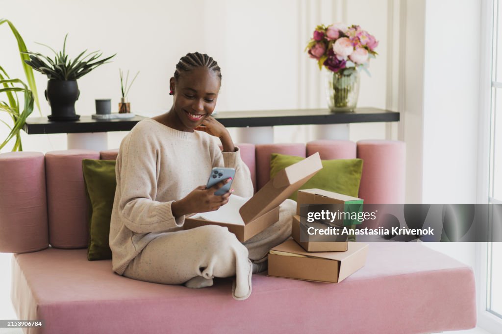 Happy woman checking clothes and calling to customer service.