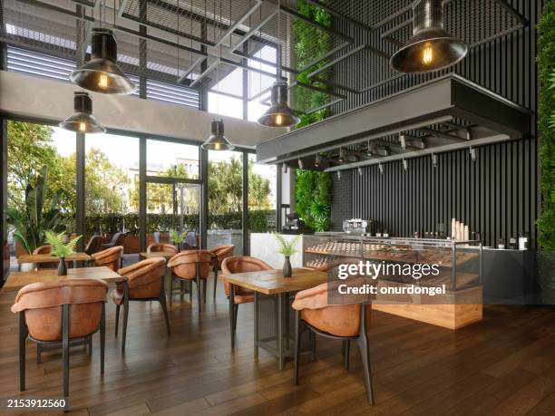 interior de cafetería moderna con mesas, cafetera, pasteles y jardín amurallado - café bar fotografías e imágenes de stock