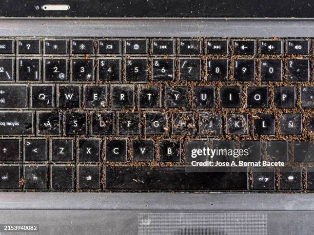 dirty and abandoned laptop keyboard. - smashed keyboard stock pictures, royalty-free photos & images