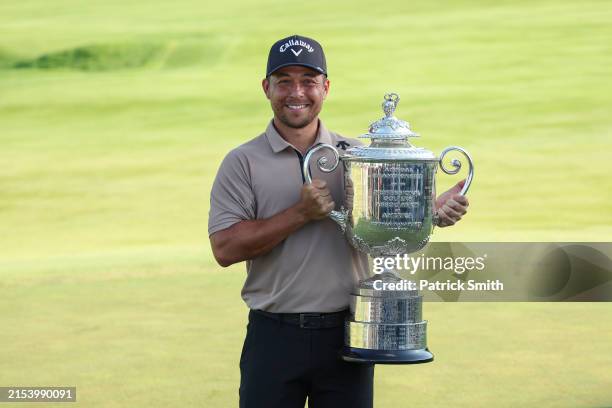Xander Schauffele of the United States poses with the Wanamaker Trophy after winning the final round of the 2024 PGA Championship at Valhalla Golf...
