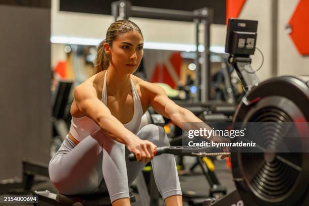 684 Women Rowing Machine Stock Photos, High-Res Pictures, and Images ...