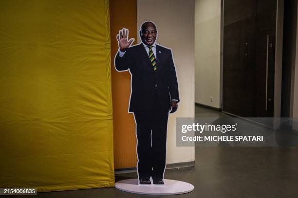 Life-size cardboard cutout of President of the African National Congress and South African President Cyril Ramaphosa is seen in a hallway at the...