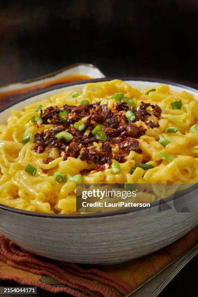 trending mac and cheese ramen with chili crunch oil - chili oil stock pictures, royalty-free photos & images