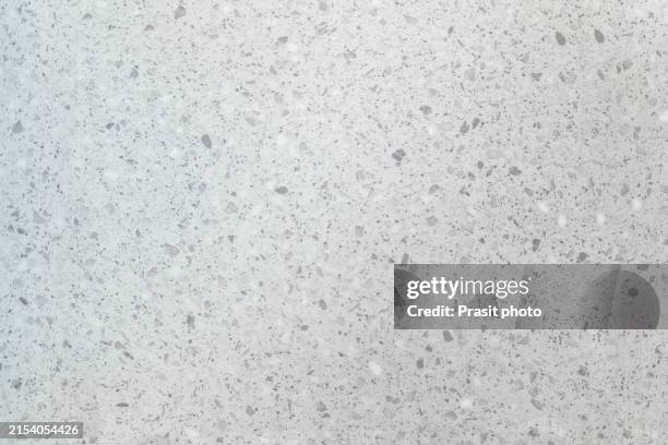 white terrazzo flooring with flecks texture background pattern - terrazzo stock pictures, royalty-free photos & images