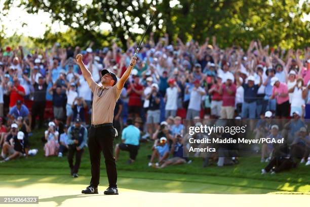 Xander Schauffele of the United States celebrates after winning on the 18th green during the final round of the 2024 PGA Championship at Valhalla...