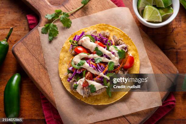 roasted pork tostada - taco stock pictures, royalty-free photos & images