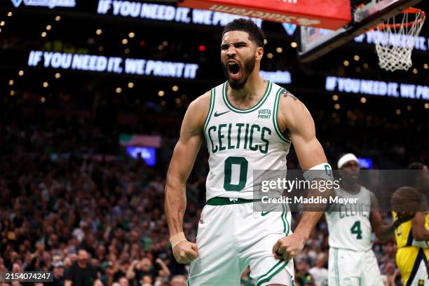 Jayson Tatum of the Boston Celtics reacts during the third quarter against the Indiana Pacers in Game One of the Eastern Conference Finals at TD...