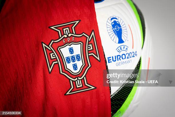Detailed view of the badge of Portugal next to the UEFA EURO 2024 official match ball during the UEFA EURO 2024 Teams Jerseys Shoot at the UEFA...